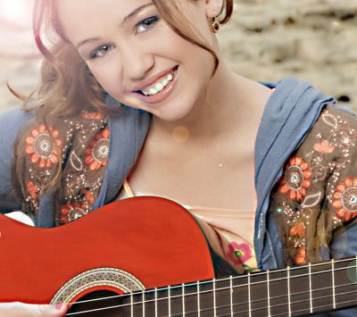 Miley Cyrus z Gitarą