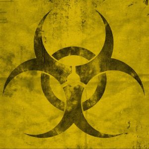 Symbol biohazard na żółtym tle