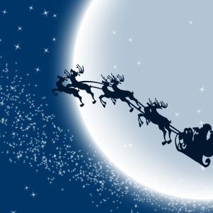 Sanie Świętego Mikołaja na nocnym niebie